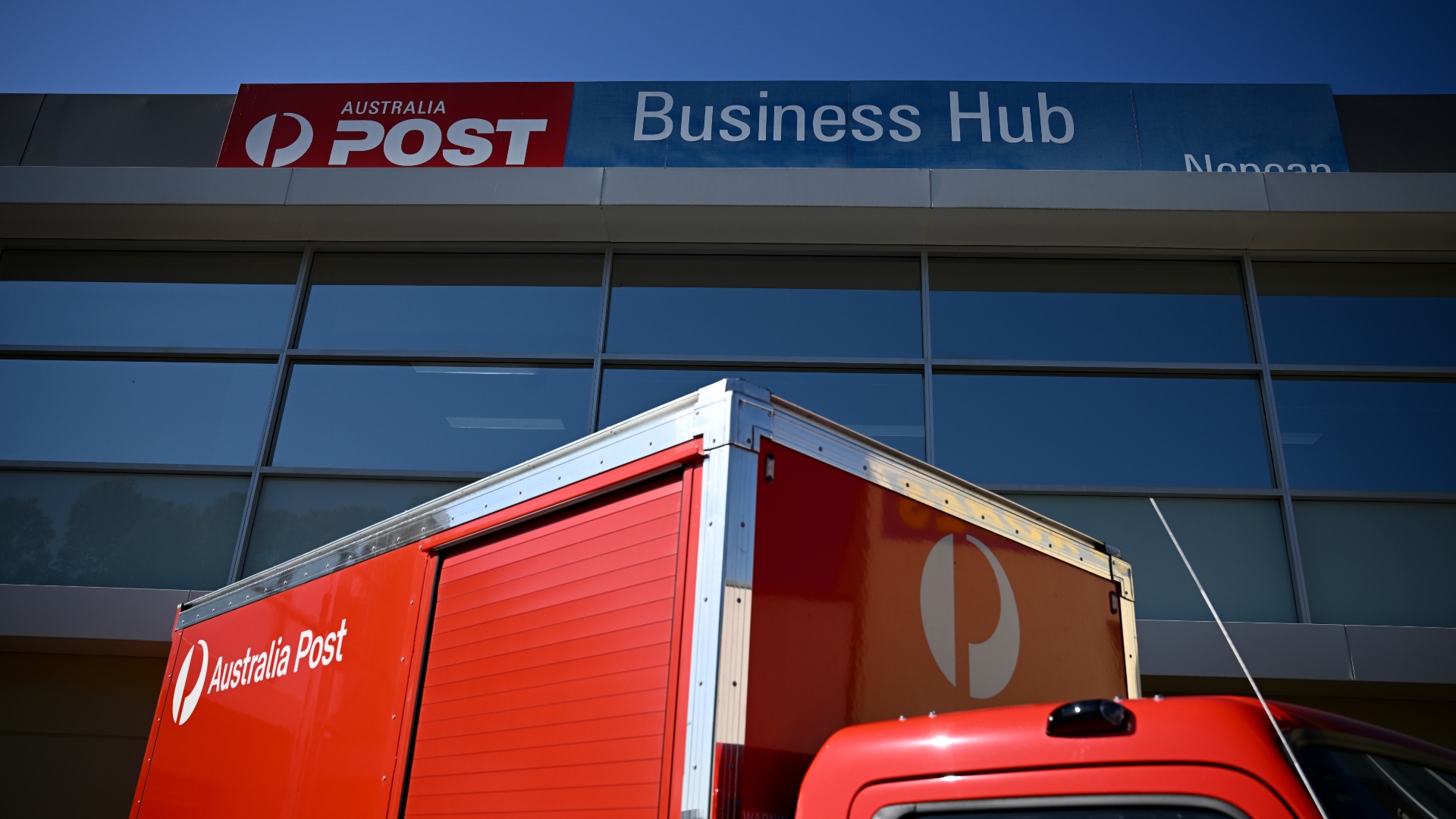 Local businesses rocked by Australia Post’s US delivery suspension