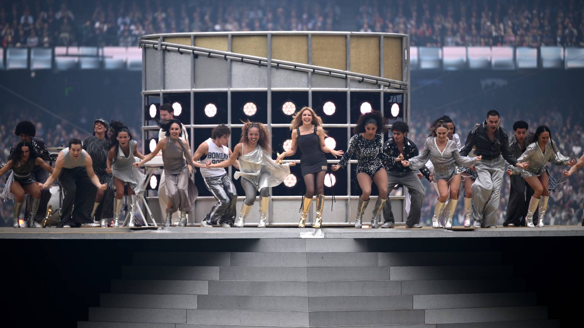 Can't get boots out of my head: Kylie Minogue sports Bared Footwear for AFL show